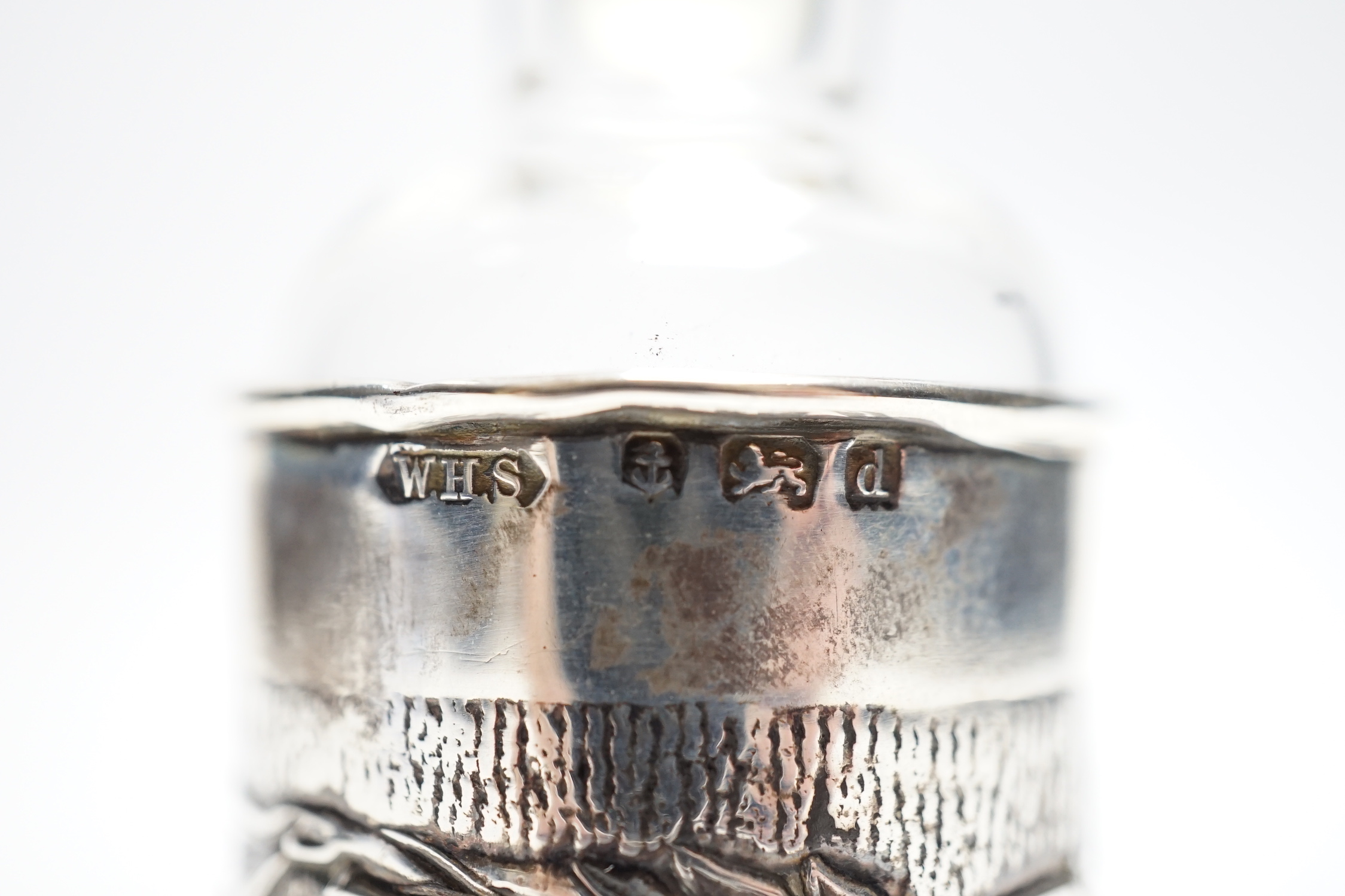 An Edwardian Art Nouveau silver mounted glass scent scent bottle and stopper, William Henry Sparrow, Birmingham, 1903, 11.7cm.